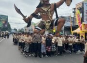 Polsek Sandubaya Kawal Ketat Pawai Ogoh-Ogoh Menuju Lokasi Parade