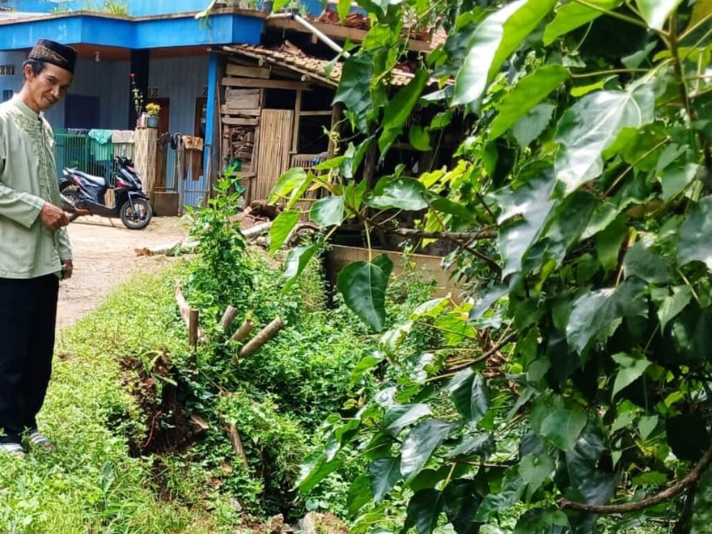 Hujan Deras Rusak Infrastruktur dan Lahan Pertanian di Desa Cihaurkuning Malangbong