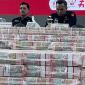 Ruang Konfrensi Pers Kejagung Dipenuhi Tumpukan Uang Senilai Rp11,8 Triliun, Tertinggi Sepanjang Sejarah