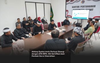 Abdusy Syakur Amin Perkuat Sinergi dengan ATR BPN, 401 Sertifikat Aset Pemkab Garut Diserahkan locusonline featured image Feb